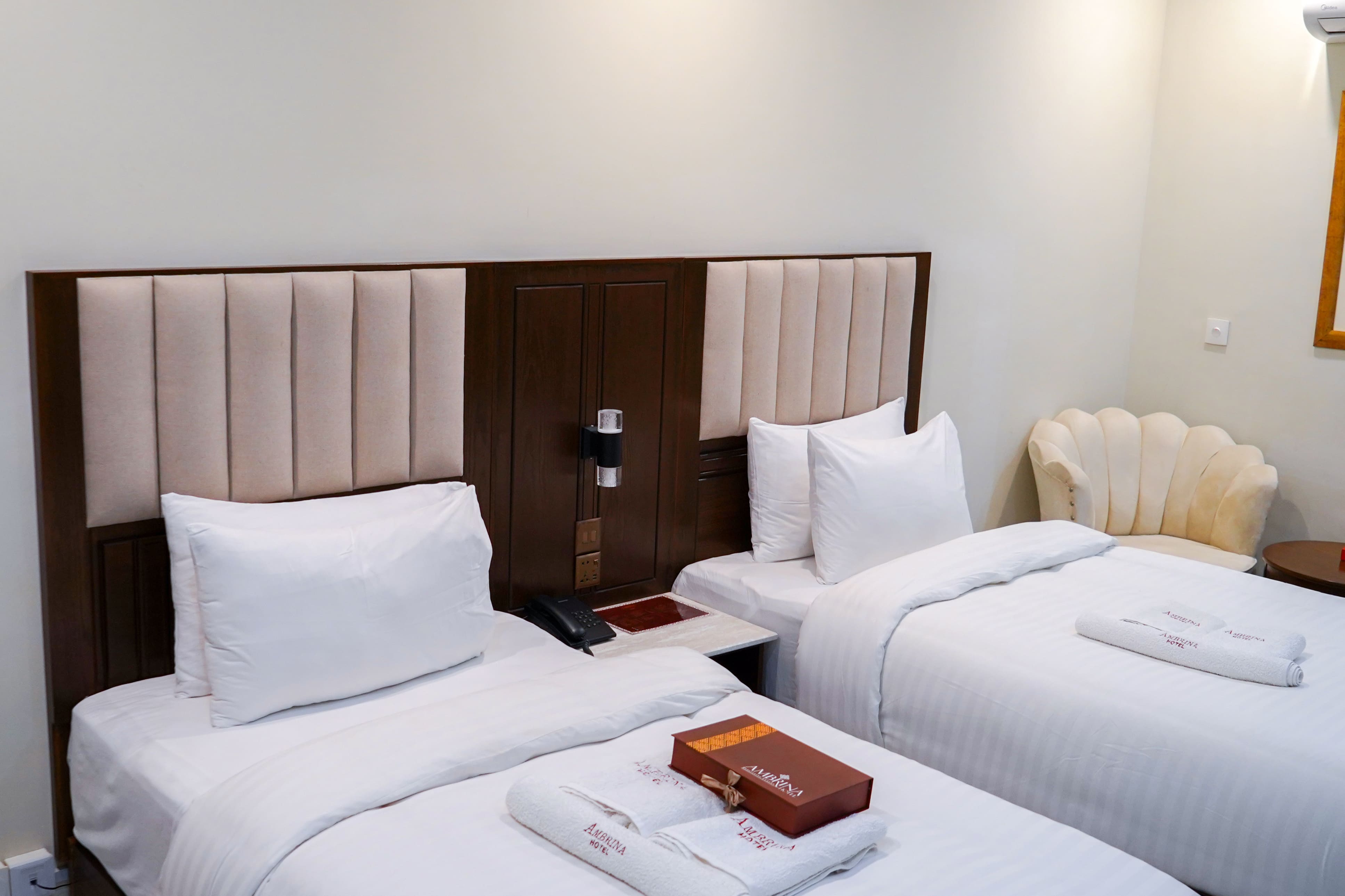 Deluxe Twin Room at Ambrina Hotel TopCity-1 Islamabad - Family-friendly accommodation near airport